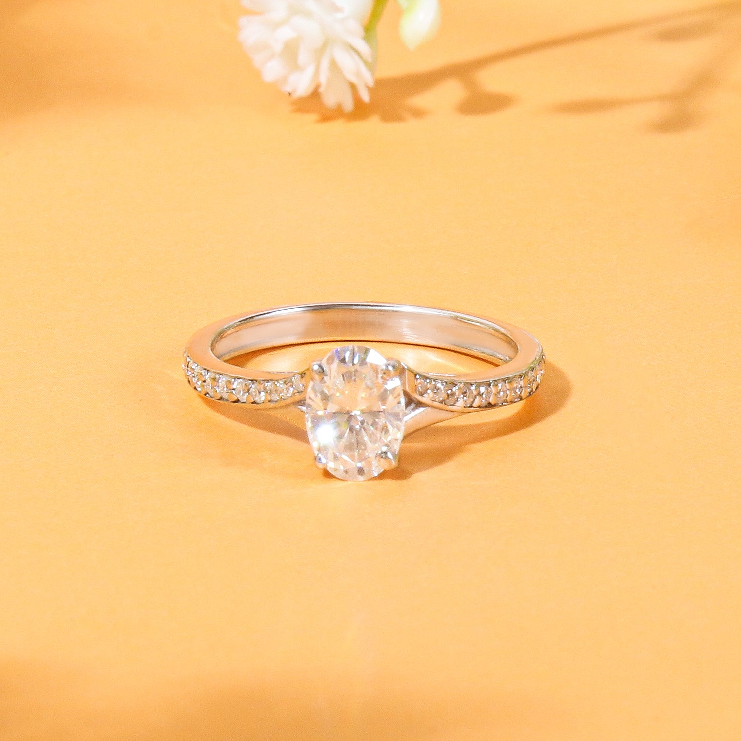 1.03 CARAT Oval Moissanite Solitaire with Side Accents Engagement Ring in 14K White Gold Plated