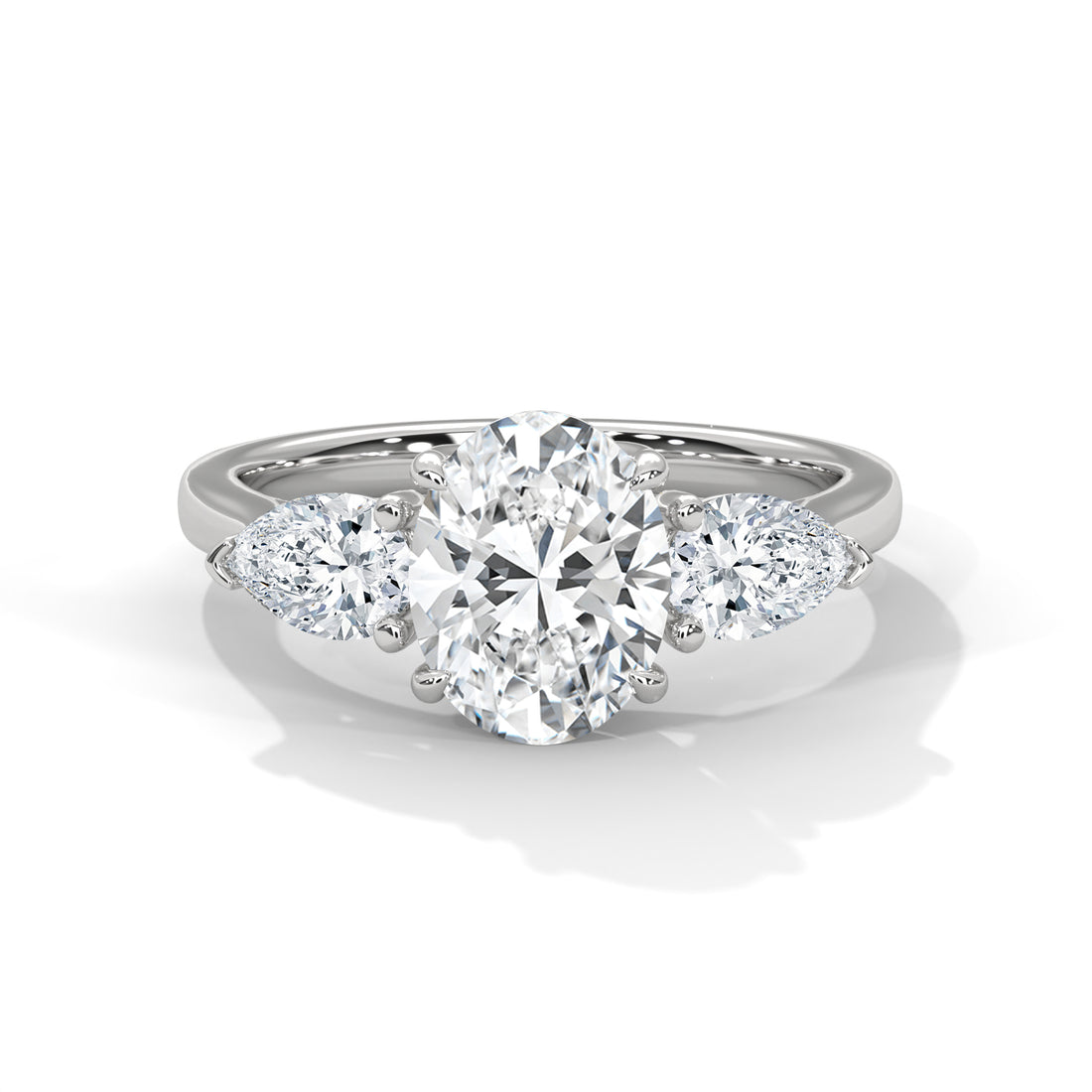 2 CT Oval And Pear Cut Three Stone Solitaire Diamond Ring