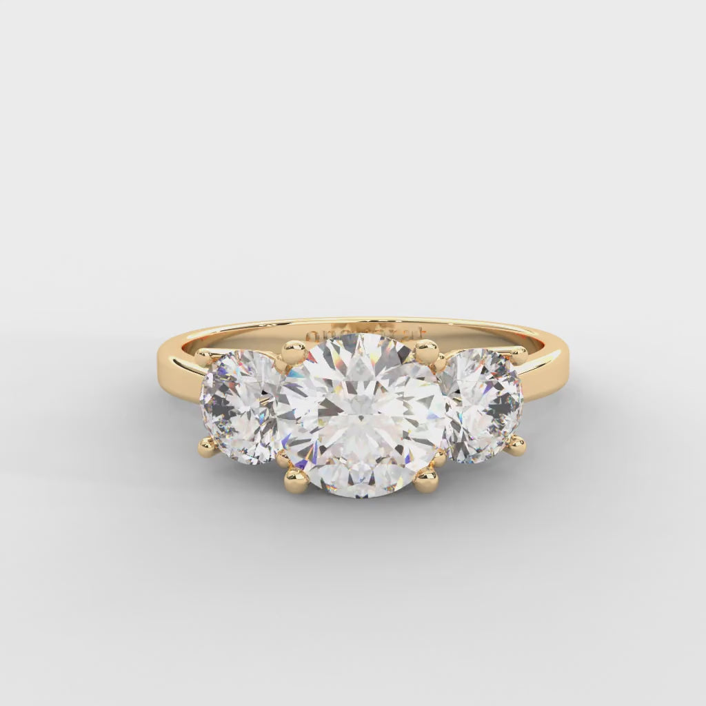 1.06 CARAT Round Moissanite Three Stone Engagement Ring in 14K Yellow Gold Plated